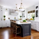 White Kitchen Cabinets With Contrasting Island